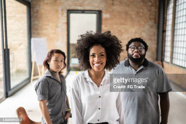 portrait of business team together in the office - corporate gender equality stock pictures, royalty-free photos & images