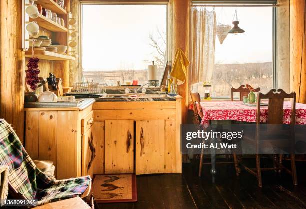 interior of a rustic wood cabin in winter - farmhouse stock pictures, royalty-free photos & images