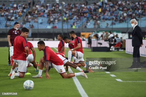 Head coach of Venezuela Jose Nestor Pekerman looks at his players warming up before a match between Uruguay and Venezuela as part of FIFA World Cup...