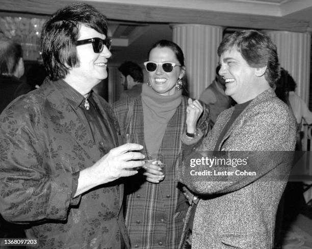 American singer, songwriter, and musician Roy Orbison , German-born United States-based entrepreneur, music producer and publisher Barbara Orbison,...