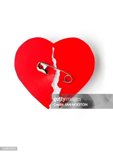 illustrazioni stock, clip art, cartoni animati e icone di tendenza di mending a broken heart, conceptual image - cuore spezzato