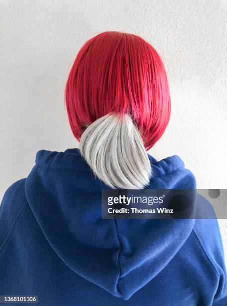 woman with white ponytail and red wig from behind - grey hair back stock pictures, royalty-free photos & images