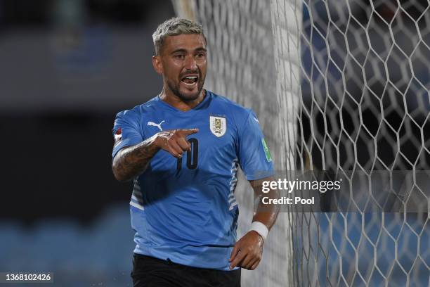 Giorgian De Arrascaeta of Uruguay celebrates after scoring the second goal of his team during a match between Uruguay and Venezuela as part of FIFA...