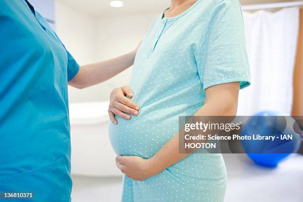 birthing centre - midwife stock pictures, royalty-free photos & images