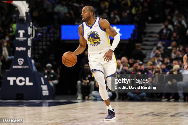 Andre Iguodala of the Golden State Warriors dribbles the ball against the Minnesota Timberwolves in the second quarter of the game at Target Center...