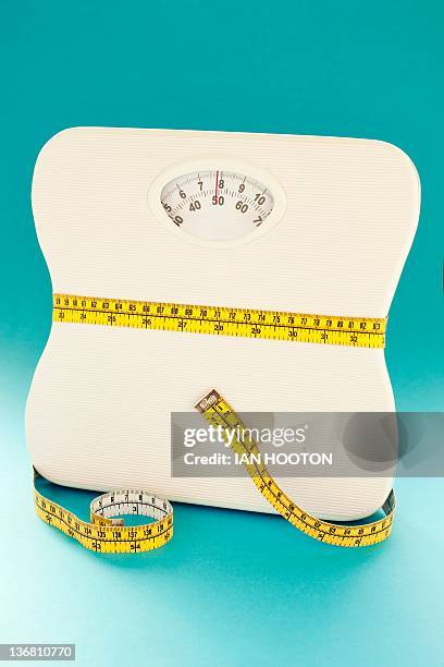 dieting, conceptual image - tape measure stock pictures, royalty-free photos & images