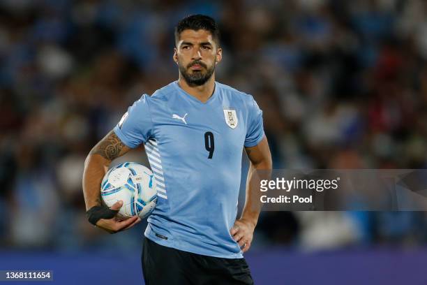 Luis Suarez of Uruguay holds the ball before taking a penalty during a match between Uruguay and Venezuela as part of FIFA World Cup Qatar 2022...