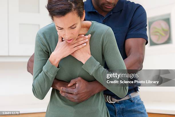 heimlich manoeuvre - choking stock pictures, royalty-free photos & images