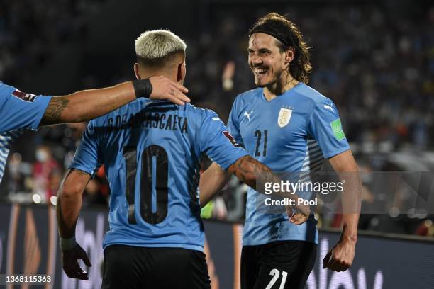 Edinson Cavani of Uruguay celebrates with teammate Giorgian De Arrascaeta during a match between Uruguay and Venezuela as part of FIFA World Cup...