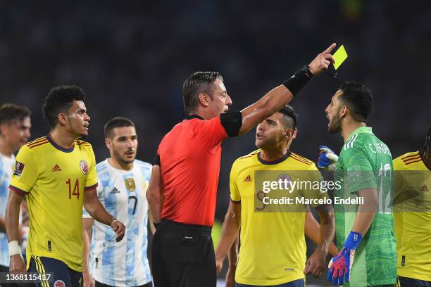 Radamel Falcao and Camilo Vargas goalkeeper of Colombia argue with referee Raphael Claus during a match between Argentina and Colombia as part of...