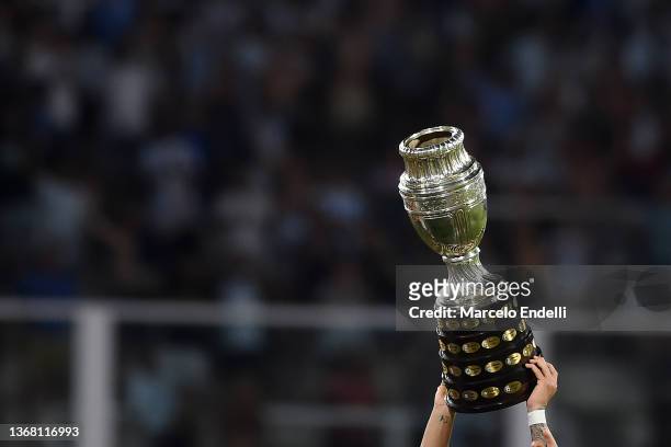 Lautaro Martinez of Argentina celebrates with the Copa America 2021 trophy after winning a match between Argentina and Colombia as part of FIFA World...