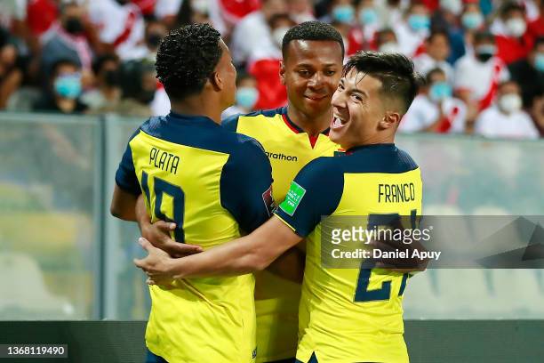 Michael Estrada of Ecuador celebrates with teammates Gonzalo Plata and Alan Steven Franco after scoring the first goal of his team during a match...