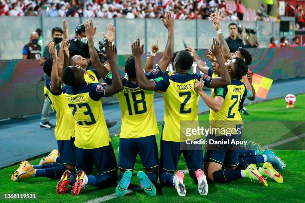 Michael Estrada of Ecuador celebrates with teammates after scoring the first goal of his team during a match between Peru and Ecuador as part of FIFA...