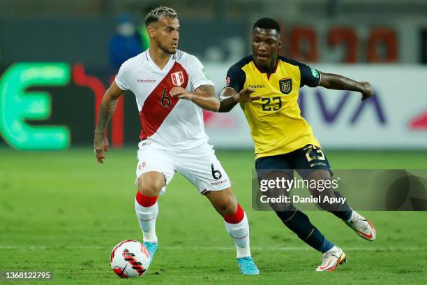 Miguel Trauco of Peru competes for the ball with Moises Caicedo of Ecuador during a match between Peru and Ecuador as part of FIFA World Cup Qatar...