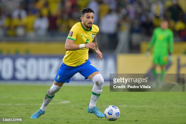 Alex Telles of Brazil drives the ball during a match between Brazil and Paraguay as part of FIFA World Cup Qatar 2022 Qualifiers at Mineirao Stadium...