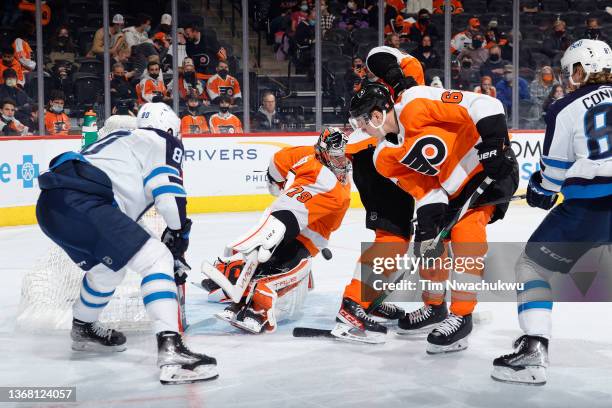 Carter Hart of the Philadelphia Flyers makes a save during the third period against the Winnipeg Jets at Wells Fargo Center on February 01, 2022 in...