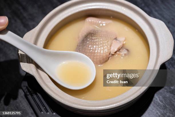 bowl of  chinese style chicken soup - chicken soup stock pictures, royalty-free photos & images