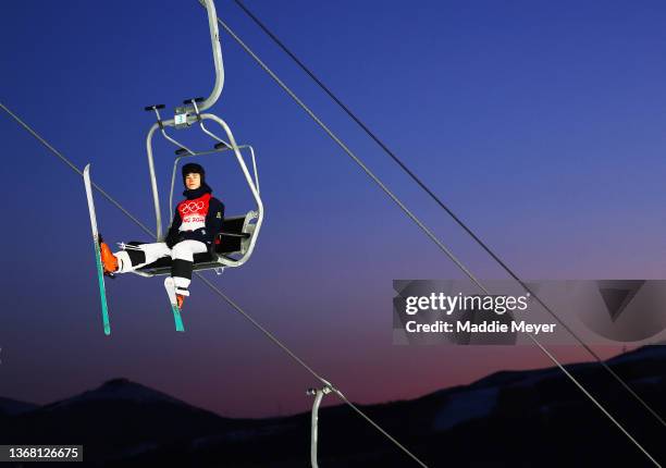 Walter Wallberg of Team Sweden is seen using a chair lift as the great wall of china is seen in the background during the Men's Freestyle Skiing...