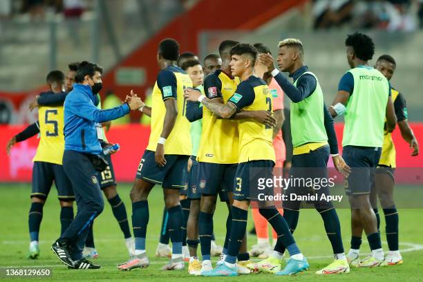 Piero Hincapie of Ecuador hugs with teammates after a a match between Peru and Ecuador as part of FIFA World Cup Qatar 2022 Qualifiers at National...