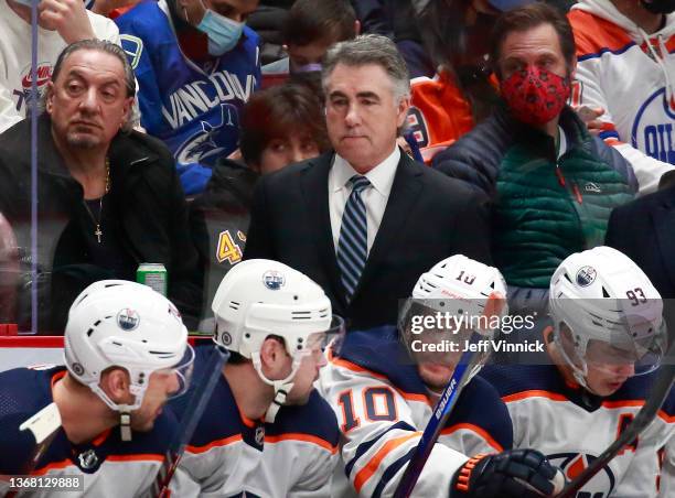 Head coach Dave Tippett of the Edmonton Oilers looks on from the bench during their NHL game against the Vancouver Canucks at Rogers Arena January...