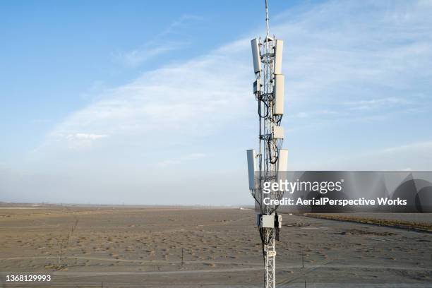 aerial view of 5g cellular communications tower - antenna aerial stock pictures, royalty-free photos & images
