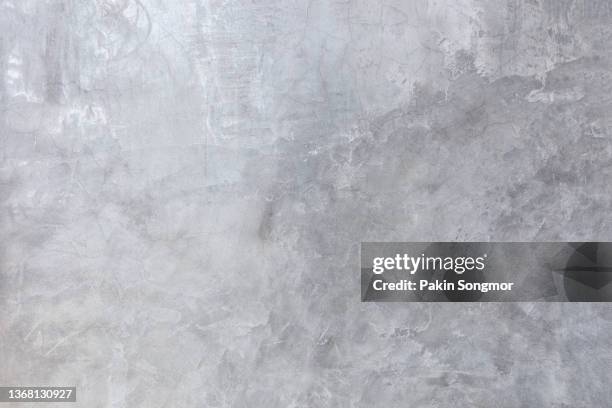 the background is a concrete texture that looks like an old grunge wall in a loft interior. - vignette stock pictures, royalty-free photos & images