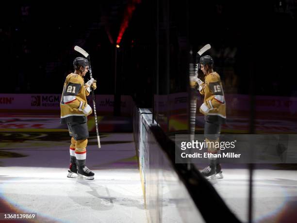 Brett Howden of the Vegas Golden Knights is reflected in the glass as he skates on the ice after being named the first star of the game following the...