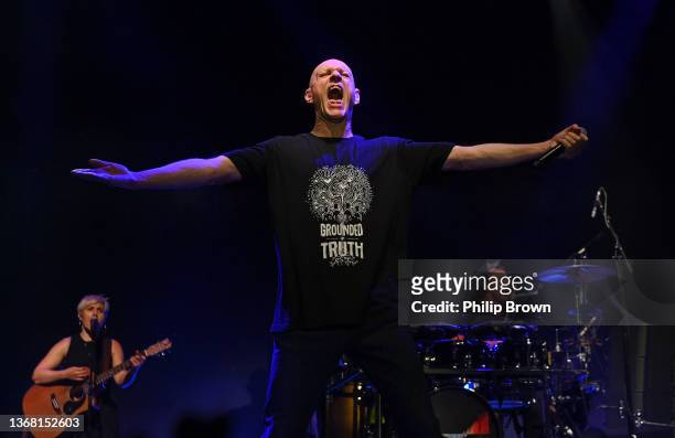 Peter Garrett, lead singer of Midnight Oil sings during a performance at Mona Foma Festival with Liz Stringer and drummer Rob Hirst also on stage on...