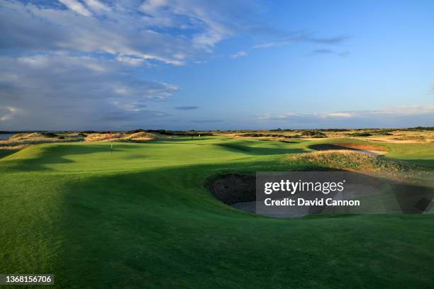 General view of the green on the par 3, 11th hole with the green on the par 4, seventh hole behind on The Old Course at St Andrews on August 14, 2021...