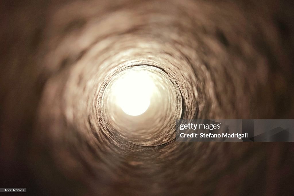 Texture concept of tunnel with light at the end
