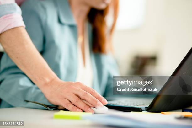 businessman sexually harassing a female employee in an office - aggression bildbanksfoton och bilder