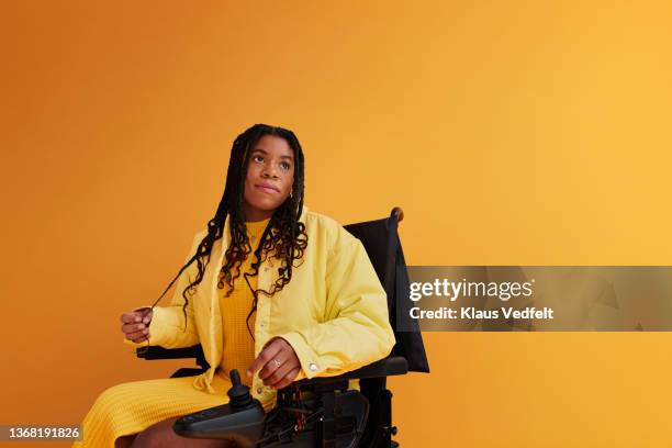 woman with disability having braided hair - before the 24 stock pictures, royalty-free photos & images