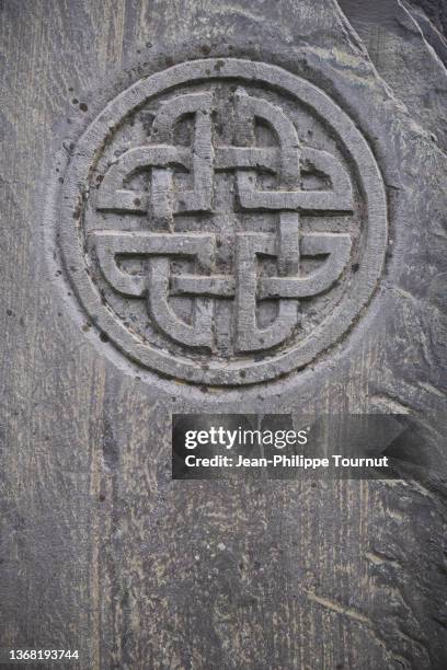 celtic tombstone background, county kerry, ireland - celtic symbols stockfoto's en -beelden