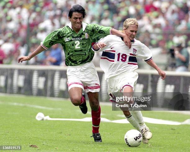 Claudio Suarez of Mexico and Chris Henderson of the United States in action during the game between United States and Mexico in Azteca stadium in...