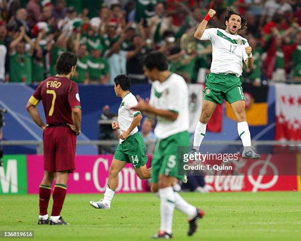 Jose Fonseca celebrates scoring for Mexico during the Group D match between Portugal and Mexico at FIFA World Cup stadium Gelsenkirchen, Germany on...