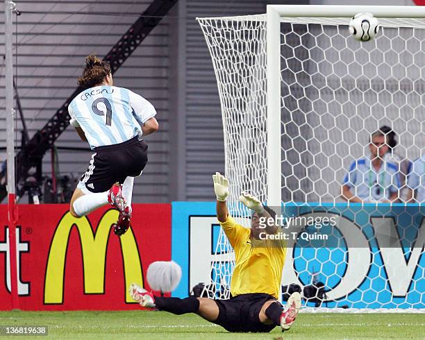 Oswaldo Sanchez of Mexico knocks a shot from Hernan Crespo of Argentina over the bar during the Round of 16 match at Zentralstadion in Leipzig,...