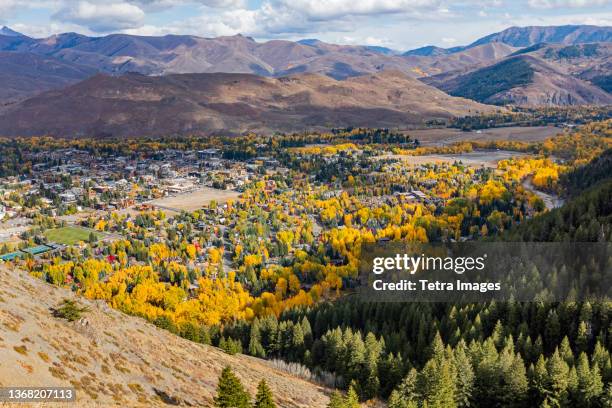 usa, idaho, ketchum, town in valley in autumn, seen from bald mountain - idaho stock pictures, royalty-free photos & images