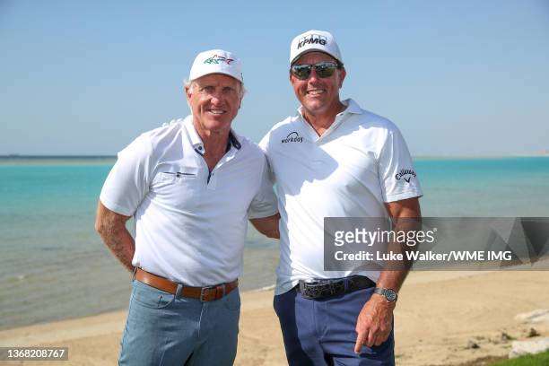 Phil Mickelson of USA and Greg Norman, CEO of Liv Golf Investments interact during a practice round prior to the PIF Saudi International at Royal...