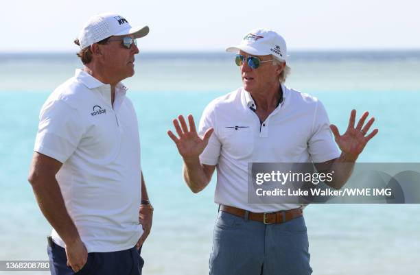 Phil Mickelson of USA and Greg Norman, CEO of Liv Golf Investments interact during a practice round prior to the PIF Saudi International at Royal...