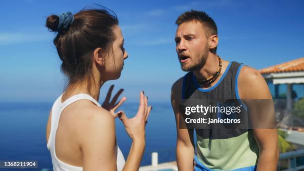 the couple that argues together stays together. quarrel on vacation - hot wife stockfoto's en -beelden