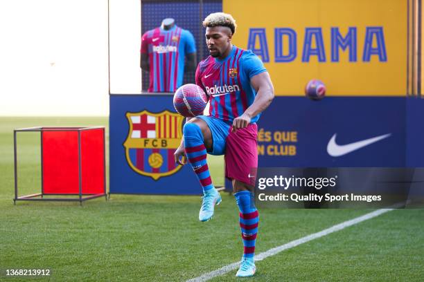 New Barcelona signing Adama Traore poses for the media as a FC Barcelona player at Camp Nou on February 02, 2022 in Barcelona, Spain.