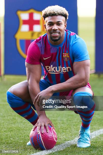 New Barcelona signing Adama Traore poses for the media as a FC Barcelona player at Camp Nou on February 02, 2022 in Barcelona, Spain.