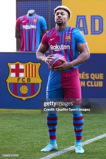 New Barcelona signing Adama Traore poses for the media as a FC Barcelona player at Camp Nou on February 02, 2022 in Barcelona, Spain.