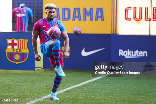 New Barcelona signing Adama Traore poses for the media as a FC Barcelona player at Camp Nou on February 02, 2022 in Barcelona, Spain.
