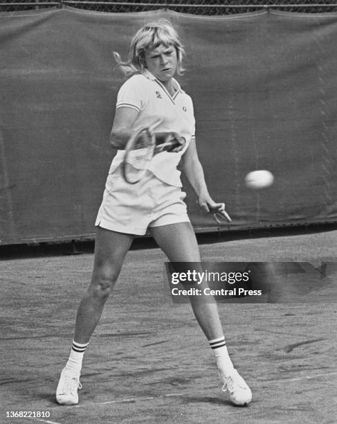 Sue Barker from Great Britain keeps her eyes on the tennis ball as she play a forehand return against compatriot Belinda Thompson during their Girl's...