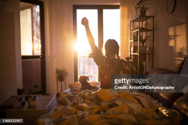 waking up with the sun. - waking up stock pictures, royalty-free photos & images