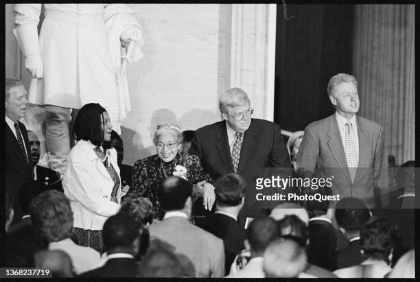 American Civil Rights activist Rosa Parks smiles during a ceremony where she was presented the Congressional Gold Medal, Washington DC, June 15,...