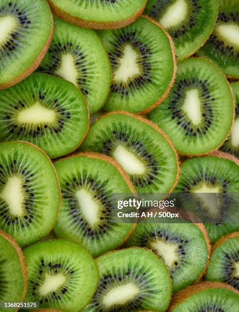 full frame shot of kiwi - kiwi fruit stock pictures, royalty-free photos & images