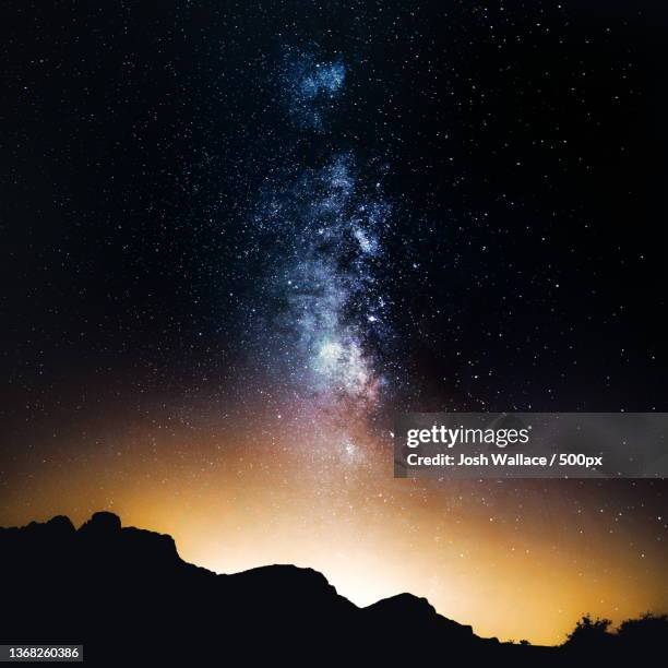 only dreams keep me alive,low angle view of silhouette of mountain against sky at night,tucson,arizona,united states,usa - tucson stock pictures, royalty-free photos & images