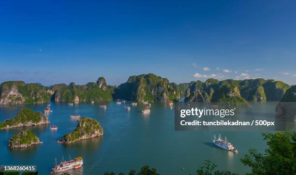 halong bay,panoramic view of bay against sky - halong bay stock pictures, royalty-free photos & images